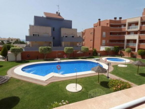 Ground floor apartment with private terrace and community pool